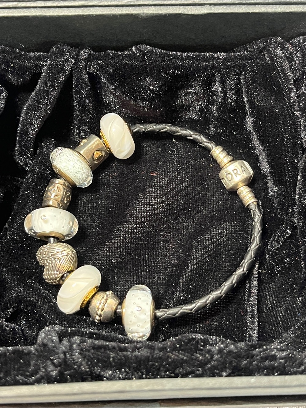 Pandora Black Leather Bracelet with 9 Accent Charms (7 Pandora Beads)
7.25”